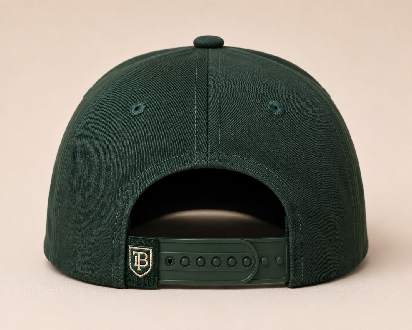 Green cap with a logo on a beige background