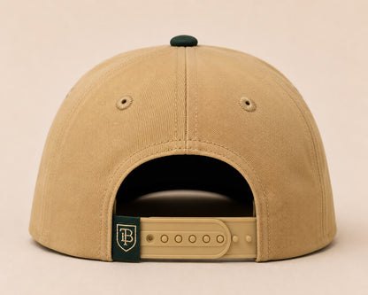 Beige cap with a brand logo on a beige background