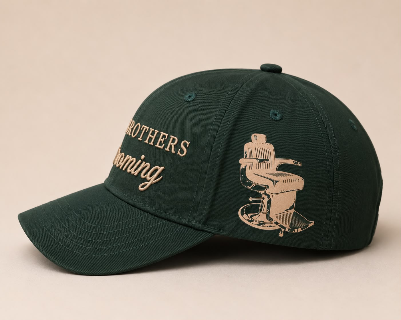 Green cap with embroidered design and text on a beige background